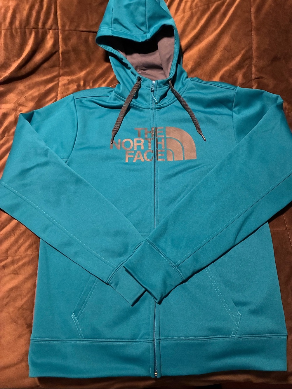 The North Face Blue Zip-Up Hoodie with Logo, size medium, warm, comfortable